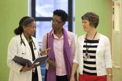 care team in a clinic, three providers
